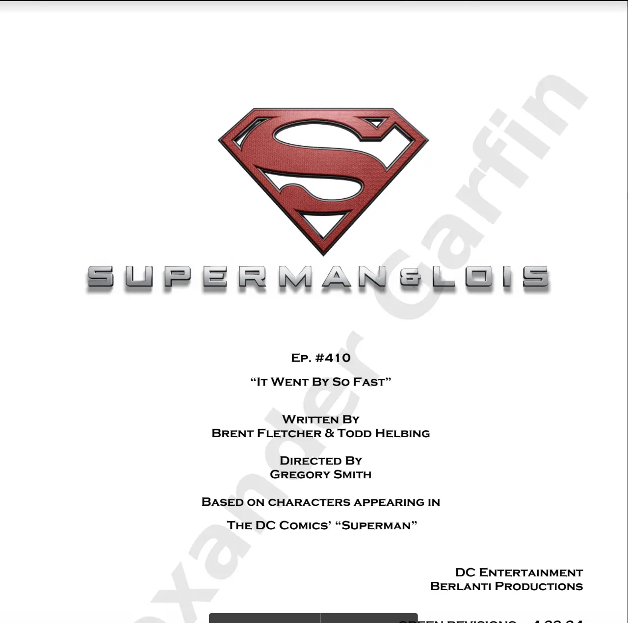 A red superman logo on the front of a movie script.