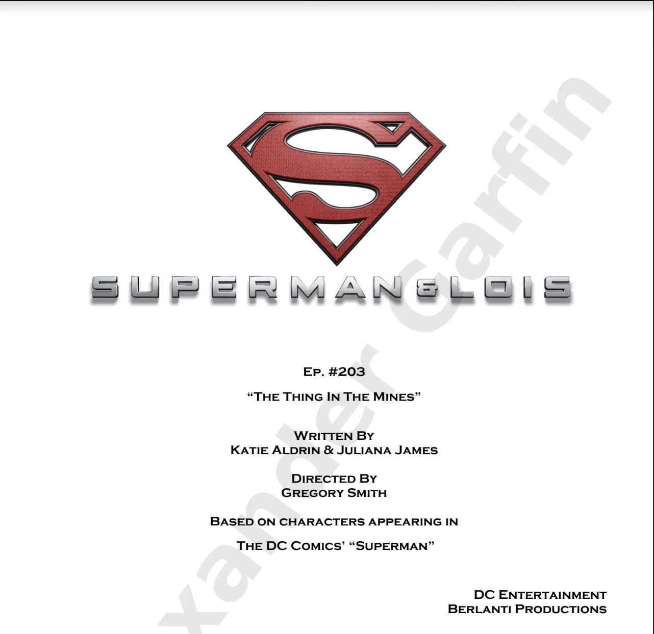 A red superman logo on the front of a movie script.